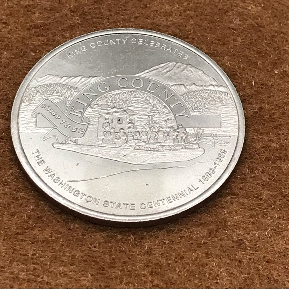 King County, Washington token from the 100th anniversary of Washington state.